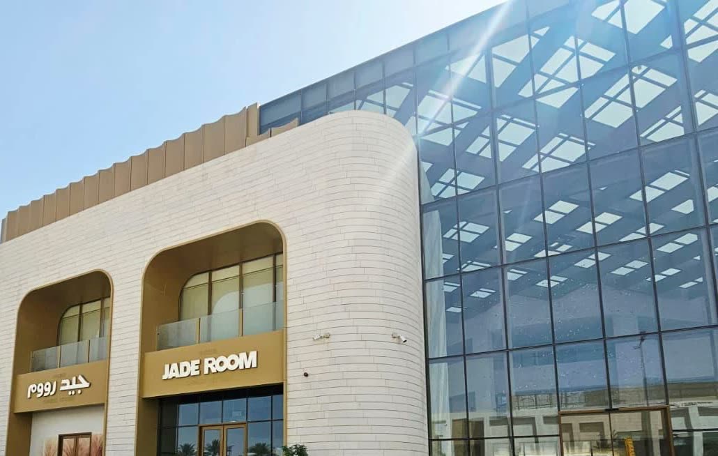 Sama Gallery's street façade with Jade Room's Arabic and English signs, Al Malqa, Riyadh